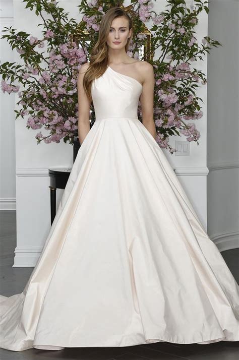 Bella bianca bridal couture - Style 22108 Madrid. Tara Keely bridal gown - Ivory organza ball gown, draped bodice with sweetheart neckline, dropped waist, layered organza textured ball gown skirt, chapel train. FIND THIS DRESS.